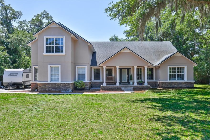 Spacious and versatile, this 4-bedroom, 3-bathroom home offers the perfect blend of comfort, functionality, and lifestyle on over 1.3 acres in the sought-after Sundance community. With a 2-car garage, enclosed pool, hurricane-rated windows, and a security system, this property is designed for year-round Florida living with plenty of room to relax, entertain, and enjoy the outdoors.
Inside, the open-concept layout seamlessly connects the kitchen, dining, and living areas, creating an inviting space for everyday living and gatherings alike. A dedicated office provides the ideal work-from-home setup, while a formal sitting room adds flexibility for a second living area, reading room, or entertaining space.
Upstairs, a spacious bonus room offers endless possibilities as a media room, playroom, gym, or additional lounge area. The primary suite is a private retreat featuring a walk-in closet and en-suite bath with dual vanities, a soaking tub, and separate walk-in shower.
Additional highlights include a dedicated laundry room and generous indoor and outdoor living spaces that make this home as practical as it is appealing.
Located in Sundance, a one-of-a-kind riverfront and equestrian community, residents enjoy a private marina and boat launch on the Little Manatee River, two community docks with water and electric, equestrian facilities with barn and paddocks, direct access to riding trails and Little Manatee River State Park, a community park, and seasonal neighborhood events. With a low annual HOA fee of approximately $271, Sundance offers a rare combination of acreage, privacy, and lifestyle amenities.
This is your opportunity to own a truly distinctive property where space, recreation, and community come together.