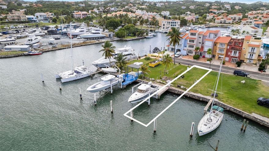 Located within the private boating community of Isla San Miguel, inside Palmas del Mar, this marina lot presents a rare opportunity for boat owners and ocean lifestyle enthusiasts. With approximately 1,485 square feet (138 m²), the property features a durable concrete dock built to accommodate vessels up to 50 feet in length.
From this privileged location, you'll enjoy direct views of the yacht club marina and easy access to open waters. Vieques lies just 14 nautical miles away, and Culebra about 30—both offering ideal routes for island-hopping or offshore fishing adventures in some of the Caribbean’s richest waters.
Public utilities are conveniently nearby, streamlining any future improvements or dock enhancements. Its close proximity to the yacht club, beach, dining venues, golf courses, and resort-style amenities makes this property a strategic gateway to the coastal lifestyle offered by Palmas del Mar.
An ideal choice for seasoned boaters or investors seeking location, functionality, and seamless access to the sea.

HOA fee 115 per month / dock fee 45 per month/ PDM HOA 1,300 per year