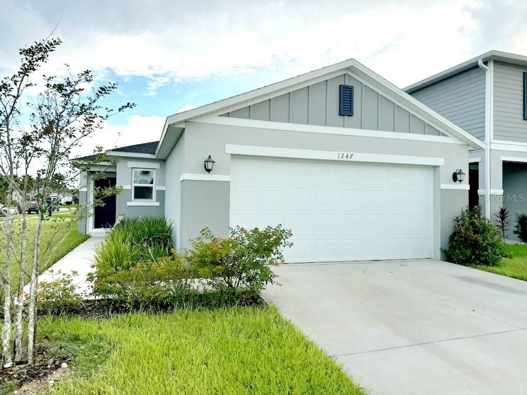 Photo of 1247 Papaya Circle, Davenport, FL 33897 (MLS # O6336256)