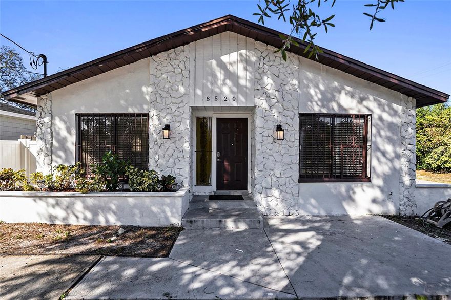 Welcome to this beautifully maintained Tampa home offering comfort, value, and flexibility in a central location. Featuring a brand-new roof (2025), this property delivers peace of mind and long-term protection for the next owner. The spacious layout provides excellent versatility — by simply adding a door, the rear portion of the home can function as a separate 2-bedroom, 1-bath suite, ideal for multi-generational living, guest accommodations, or a private work-from-home retreat. Inside, enjoy bright living areas, generous bedrooms, and a well-appointed kitchen with plenty of storage. Outside, the private backyard offers space to relax or garden. Conveniently located near major roadways, parks, shopping, and dining. Move-in ready and full of opportunity — schedule your private showing today!