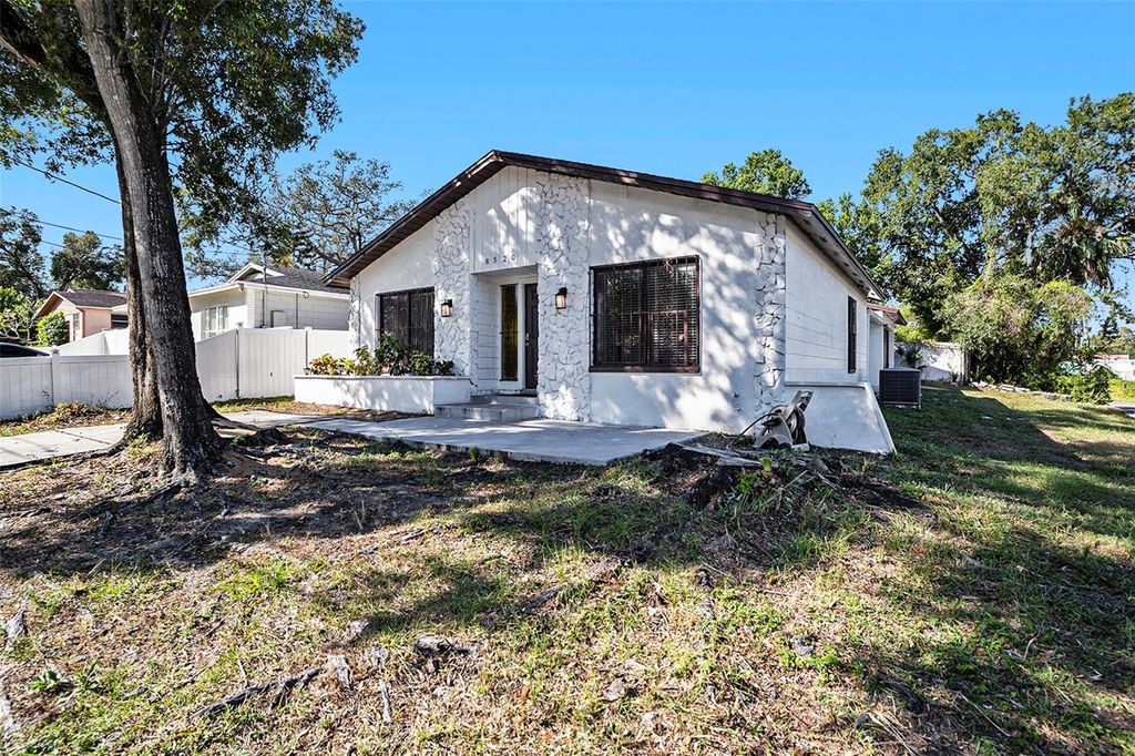 Photo of 8520 N Branch Avenue, Tampa, FL 33604 (MLS # TB8442866)