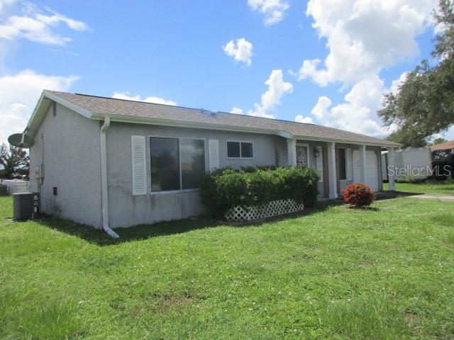 This 2 bedrom 1-1/2 bath home affords you quick access to US 41 for all points North and South. Leaded glass front entry door as you step into your living room, beyond is galley style kitchen with exit door direct to garage where laundry is also located. Dining area easily accessed right off of kitchen. Two bedrooms with primary have en suite bath with shower. Half bath can conveniently be accessed from dining and living areas but also has access from the full bath in the primary bedroom, so two can be getting ready at the same time. Sliders in dining area lead direct to to lanai/Florida room for outside enjoyment an/or entertaining. This affordable home is just waiting for the right owners to make it shine once again.