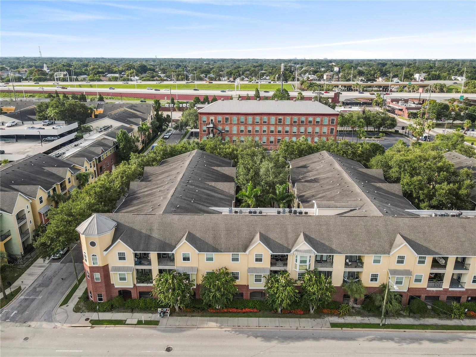 If you're looking for a 1-bedroom 1-bathroom condo in the Quarters that's walking distance to Channel Side, the river walk, and has everything, this is it! Experience the perfect blend of modern upgrades and historic charm in this beautifully renovated condo in the heart of vibrant Ybor City. This thoughtfully updated unit features stainless steel appliances, granite countertops, and beautifully hand painted bricks for an added touch, making it completely move-in ready. The open layout is light and bright, with a well-appointed kitchen that includes stainless steel appliances and a stylish design ideal for both cooking and entertaining. Step out onto your private balcony and enjoy serene courtyard views, offering a peaceful escape in the middle of the city. Located in a secure gated community, residents enjoy access to premium amenities including a resort-style pool, fitness center, clubhouse, and secure parking. Whether you're looking for a primary residence, city getaway, or investment property, this home checks all the boxes. Just steps from the TECO Streetcar, top-rated restaurants, nightlife, cafes, and entertainment, this is your chance to live in one of Tampa’s most exciting and culturally rich neighborhoods. Don't miss this rare opportunity. Schedule your private showing today.