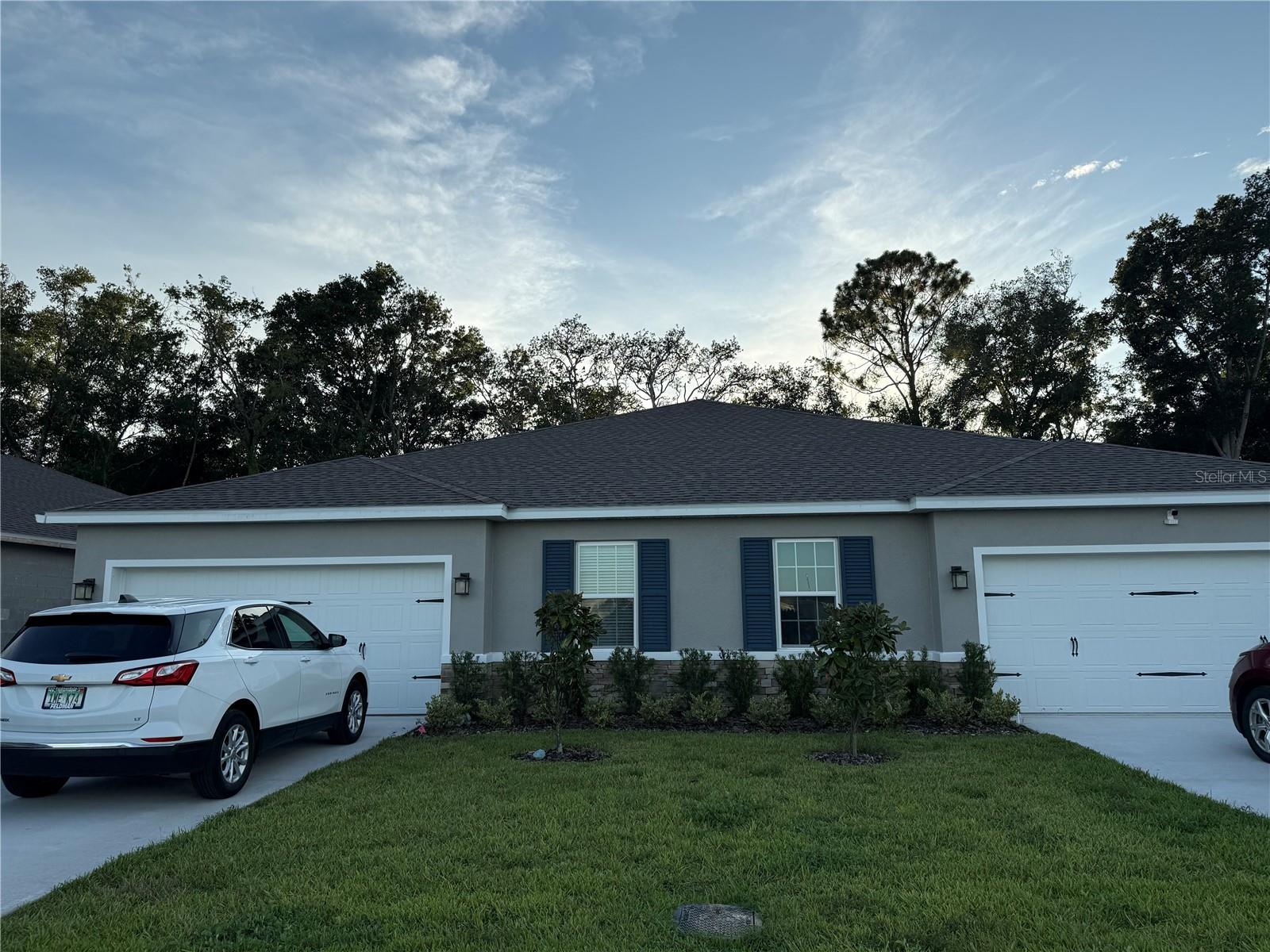 Looking for a 2025-built home but don’t want to wait for construction? This move-in-ready home is perfect for you. It features a three-bedroom split plan with two bedrooms on one side and the master suite on the other, along with two full bathrooms. The open-concept layout is highly functional, boasting a gourmet kitchen with a large island and built-in sink. All appliances, including the washer and dryer, are included. The laundry room is conveniently situated near the garage. The master suite includes an oversized walk-in closet and a master bath with a shower and double sinks. The living room provides beautiful views of the covered lanai and the privacy-fenced backyard.