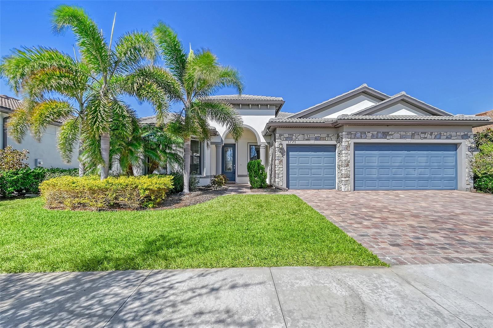 Popular Pinnacle floor plan in Hammock Preserve on Palmer Ranch. Built solid by Divosta Builders, house had no damage from hurricane. This exceptional lake front home features 3 generous bedrooms, one is a suite for guests, office & 3 car garage. Very open & spacious great room floor plan. Upgraded kitchen with white cabinets, quartz counters, large walk around center island & upgraded stainless appliances. Tile throughout living area including master with 2 guest bedrooms carpeted. Expansive master bedroom with expanded walk-in shower & substantial walk-in closet. Owners have added accordion shutters for easy deployment. Whole house generator. Expanded paver brick lanai with free standing hot tub, plumbed for an outdoor kitchen & big lake views. This home shows light & bright. There is room to add a private pool if someone desires too. Hammock Preserve is a resort style maintenance free community. The maintenance fee covers all landscaping, maintenance of the irrigation system & access to resort amenities including clubhouse with activity director, heated Olympic pool, jacuzzi, fire pit, fitness, tennis, pickle ball & boccie. Located on popular Palmer Ranch just minutes from shopping & beautiful Siesta Key Beach.