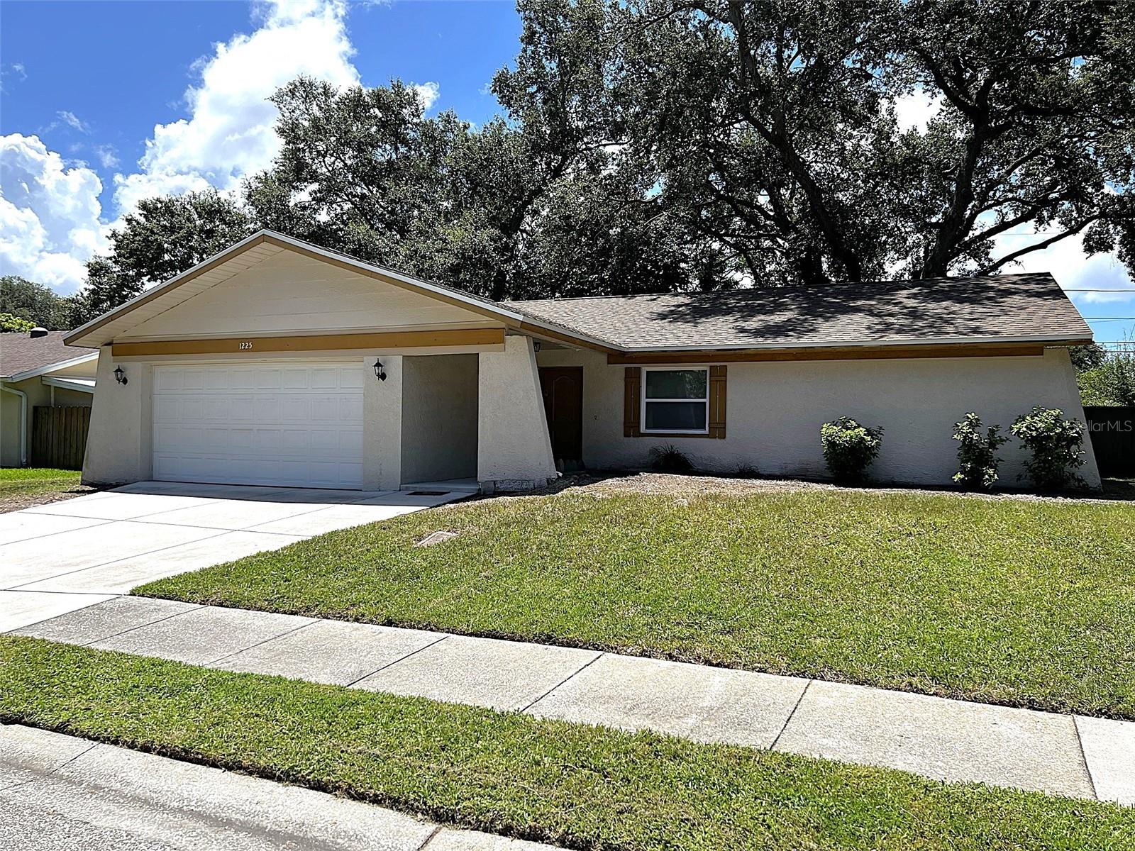 Fantastic FULLY RENOVATED 3/2 HOME in the Whisper Highlands Community. NEWER FLOORING, PAINT, PREMIUM AC! KITCHEN has all NEWER CABINETS, GRANITE COUNTERTOPS and PREMIUM WHILPOOL STAINLESS APPLIANCES! All bedrooms have plush NEWER carpet! Master has WALK-IN CLOSET, and both bathrooms are completely renovated... The FENCED backyard is nestled in the shade of large trees with a huge SCREENED PORCH, plus there’s a shed on the side. NEW washer and dryer in the 2 car garage. Best of all, the home sits 3 doors away from the HIGHLAND RECREATION COMPLEX which has over a mile of asphalt trails, a stocked four acre lake with a dock, a free outdoor gym, four lit tennis courts, two lit basketball courts, two picnic shelters, an outdoor restroom, several playground areas, an open play field, a league play senior ball field and lots of shady benches for just relaxing. Pools and slides have a very minor fee. Minutes from shopping, restaurants, the beaches, etc. Come see!