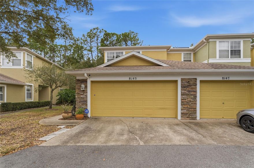 There are very few townhomes in New Tampa that provides the quiet, gated serenity that you will find in Stone Ridge at Highwood Preserves.  Surrounded by conservation, this community is hidden from traffic and occasionally you will see deer come out and play. The 3 bedroom, 2.5 bath, 2-car garage home has the conservation in its backyard.  The screened lanai is a great place for morning coffee, a place to read in the afternoon, or watch for those deer to come out in the evening.  Entering into the large foyer gives the feeling there is a lot this home offers.  The office/den is a great place to meet your guests and has many optional uses such as a dining room, playroom or game room.  The open stairway leads to all bedrooms and two baths.  The kitchen features 42" cabinets, granite counters, stainless steel appliances and a breakfast bar that overlooks the dinette and living room.  There is a large storage space under the stairway for pantry storage or other uses.  There is a half bath off the foyer and the laundry room leads to the garage.  The seller has maintained the a/c unit and added a UV light.  Dryer vent has been cleaned.  The amenities of West Meadows community center is available to the residents of Stone Ridge.  It has two junior Olympics pools, a two-story water slide, splash zone, four tennis courts, basketball, sand volleyball, playground, and fitness center. Stone Ridge is conveniently located to I-75 and provides easy access to USF, all the shopping available in Wesley Chapel (Tampa Premium Outlets, The Groves and Wiregrass Mall), many medical facilities and great restaurants.  Less than 30 minutes from Tampa International Airport.  Call for your appointment to see this great townhome.
