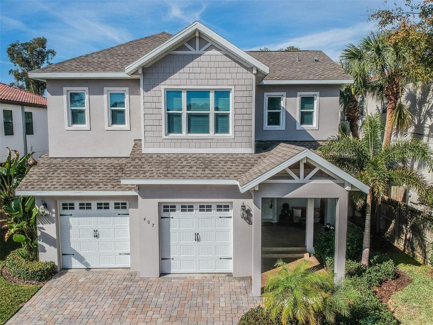 Welcome to this exquisite home in the heart of South Tampa's prestigious Palma Ceia Pines neighborhood.  This spacious 4-bedroom, 3-bathroom residence offers 3,128 sq ft of living space on a beautifully landscaped lot, blending timeless design with modern elegance.

As you enter the home, you're greeted by soaring ceilings, rich hardwood floors, and expansive living areas filled with natural light. The layout flows seamlessly from a welcoming foyer into a formal living room and dining area, all thoughtfully designed for comfort and sophistication. The chef’s kitchen is the centerpiece of the home, featuring granite countertops, custom cabinetry, stainless steel appliances, and a large center island with breakfast bar seating. It opens to a cozy family room, perfect for gatherings and entertaining.

The primary suite is a true retreat, complete with a spa-inspired en-suite bathroom that includes dual vanities, a soaking tub, walk-in shower, and an oversized walk-in closet. Three additional bedrooms offer ample space for family, guests, or a dedicated home office. 

Additional upgrades include custom lighting fixtures, a laundry/mudroom with extra storage, and elegant finishes throughout. 

Step outside to a private, enclosed pool and spa with fenced backyard ideal for entertaining or relaxing.  The property sits on an approximately 6,700 sq ft lot and is surrounded by mature landscaping.

Location is everything—and this home delivers. You're walking distance to the vibrant SoHo District, and just minutes from Hyde Park Village, Bayshore Boulevard, and some of Tampa’s best restaurants, nightlife, and parks. Zoned for A-rated schools and just a short drive to Downtown Tampa, MacDill AFB, and Tampa International Airport.

Whether you're seeking refined living or an investment in one of Tampa’s most coveted neighborhoods, 407 S Tampania Ave offers the perfect balance of quality, space, and location.