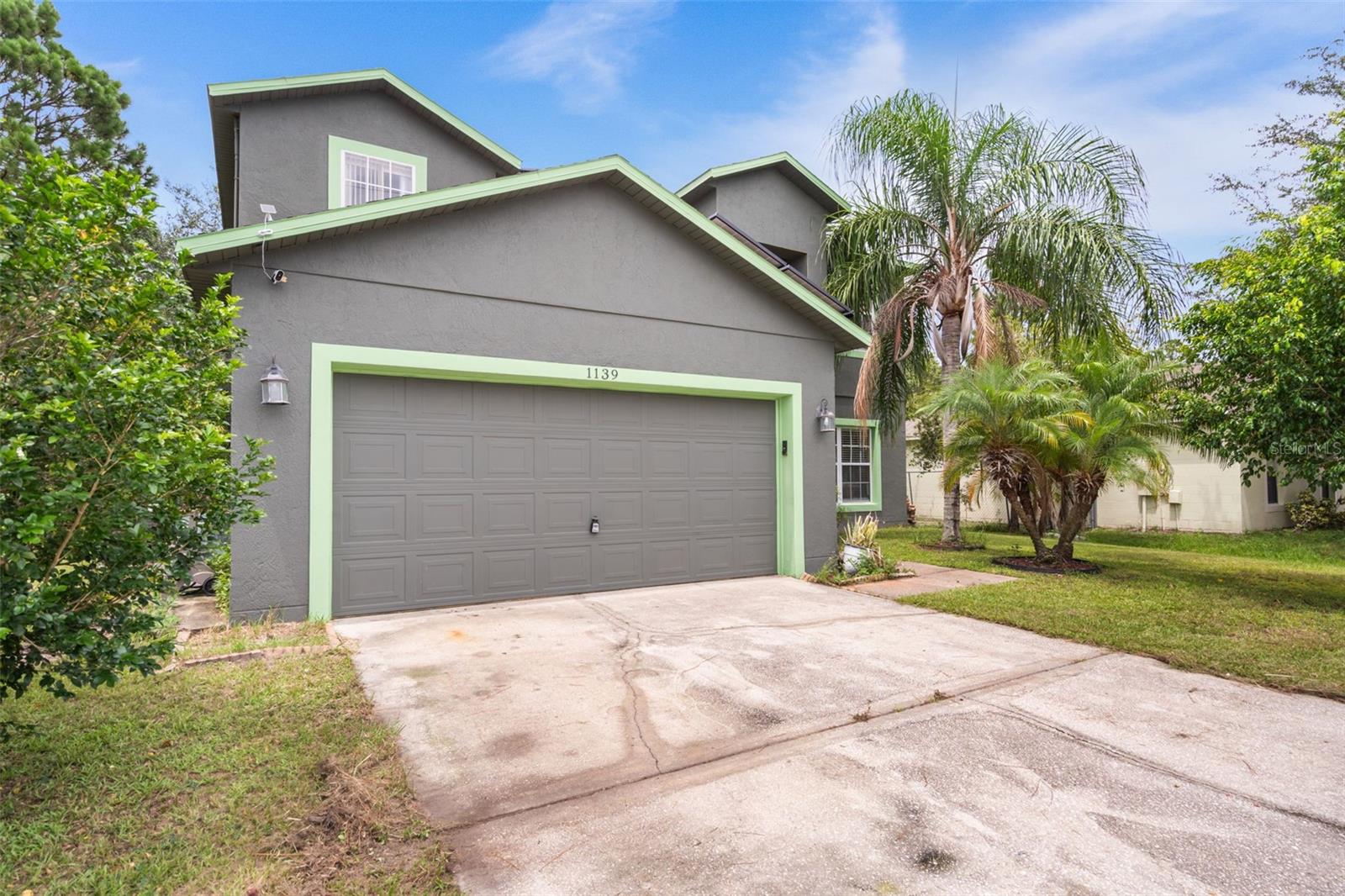 Welcome to this spacious two-story single-family home nestled in the desirable Poinciana Village 2 neighborhood. With four bedrooms and two full bathrooms (plus one half bath), spanning a generous 2,166 square feet of living space, this home harmoniously combines comfort, style, and functionality. Immerse yourself in the spacious backyard, which offers ample room for adding a pool. The living room is tiled, and all wet areas are also tiled. Enjoy the convenience of a very low HOA fee, less than $25 per month. Just a 45-minute drive from Disney, this home is conveniently located near entertainment and restaurants, making it an ideal place to call home.