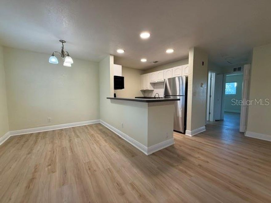 Enjoy relaxed coastal living in this well-located 2nd-floor condo within a waterfront community on the Halifax River. Waterfront building offers easy access to the riverfront, including a community deck just steps behind the building—perfect for enjoying sunsets, morning coffee, or watching boats pass by.

The condo features a comfortable and functional layout with an open living and dining area with generous natural light. Ideal as a primary residence, second home, or investment opportunity, this unit offers low-maintenance living. Brand new luxury vinyl plank floors, modern LED recessed lighting, stainless steel appliances and freshly painted interior provide an upgraded living experience. 

Recently replaced roof & windows provides a quiet and hassle free environment. 

Conveniently located just minutes from the beach, shopping, dining, marinas, Daytona Beach Shores, and Ponce Inlet, with easy access to major roadways. Experience the best of the Daytona Beach lifestyle with riverfront amenities without the riverfront price.