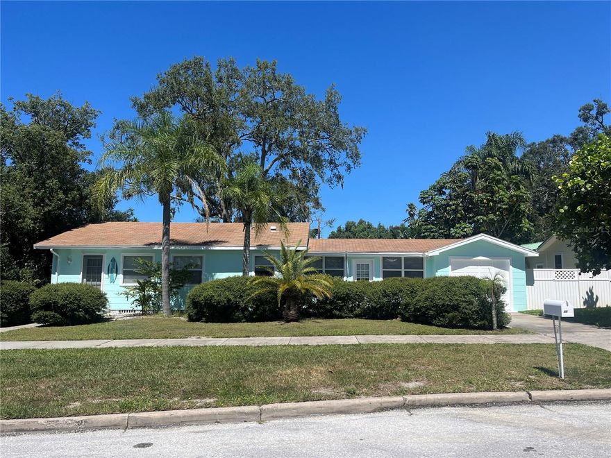 Location, location, location!  Prime Clearwater neighborhood just a couple blocks from Dunedin, in the Edgewater Drive neighborhood.  Enjoy nightly sunsets over St. Joseph’s Sound, just a short walk or golf cart ride from your front door. Take a morning walk on the Pinellas Trail to downtown Dunedin on a weekend morning and enjoy breakfast or stroll the Green Market with its many Artisan vendors.
The waterside path along Edgewater Drive is perfect for biking or walking, while Honeymoon Island and Clearwater Beach are each just a short drive away. Family and friends love baseball?  They can walk or take a golf cart TD Ballpark, home of the Toronto Blue Jays spring training, is just over a mile away, or they can take a short drive to Clearwater and watch the Philadelphia Phillies spring training.
This home is a classic Old Florida 2 bedroom, 2 bath pool home on a large fenced 84-foot oversized lot. Have your morning coffee on the spacious deck, while looking over your in-ground pool!
Unwind and reconnect in the spacious living area, or whip up delicious meals in the fully equipped kitchen. After a day exploring Clearwater's award-winning beach, take a refreshing dip in the pool and soak up the warm Florida sun.
This home is move-in ready and waiting for your finishing touches to make it your own, whether you will live here full-time, or use it as your tropical getaway from the cold winter weather!
