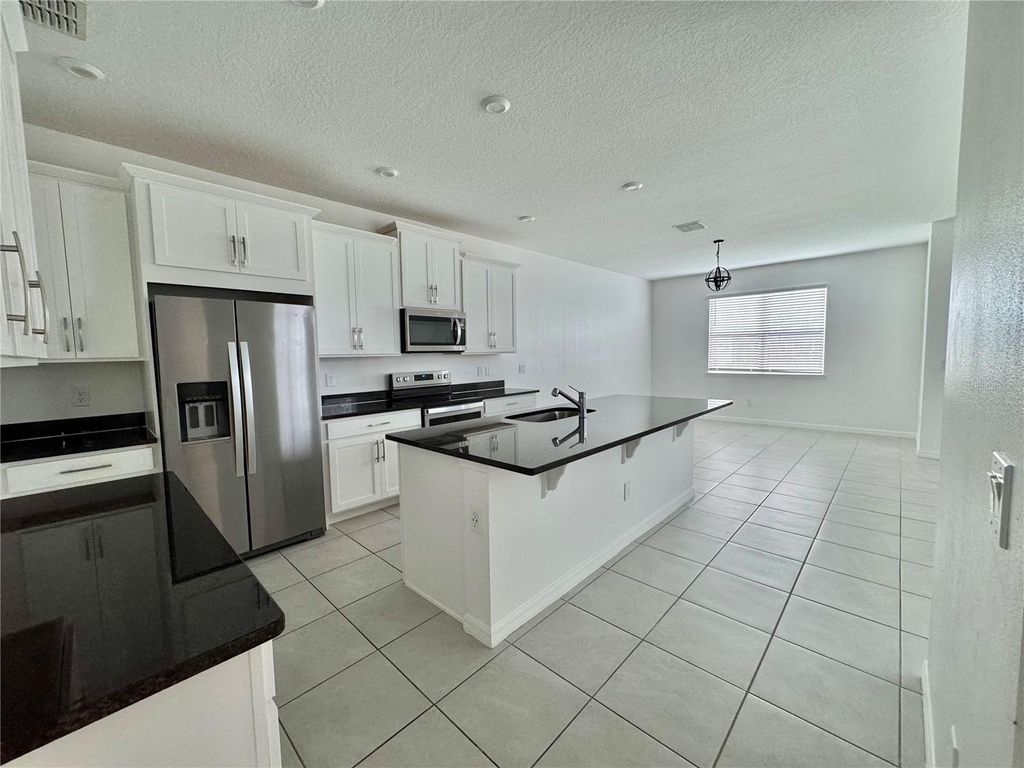 Photo of 8973 Matriarca Alley, Windermere, FL 34786 (MLS # O6387553)