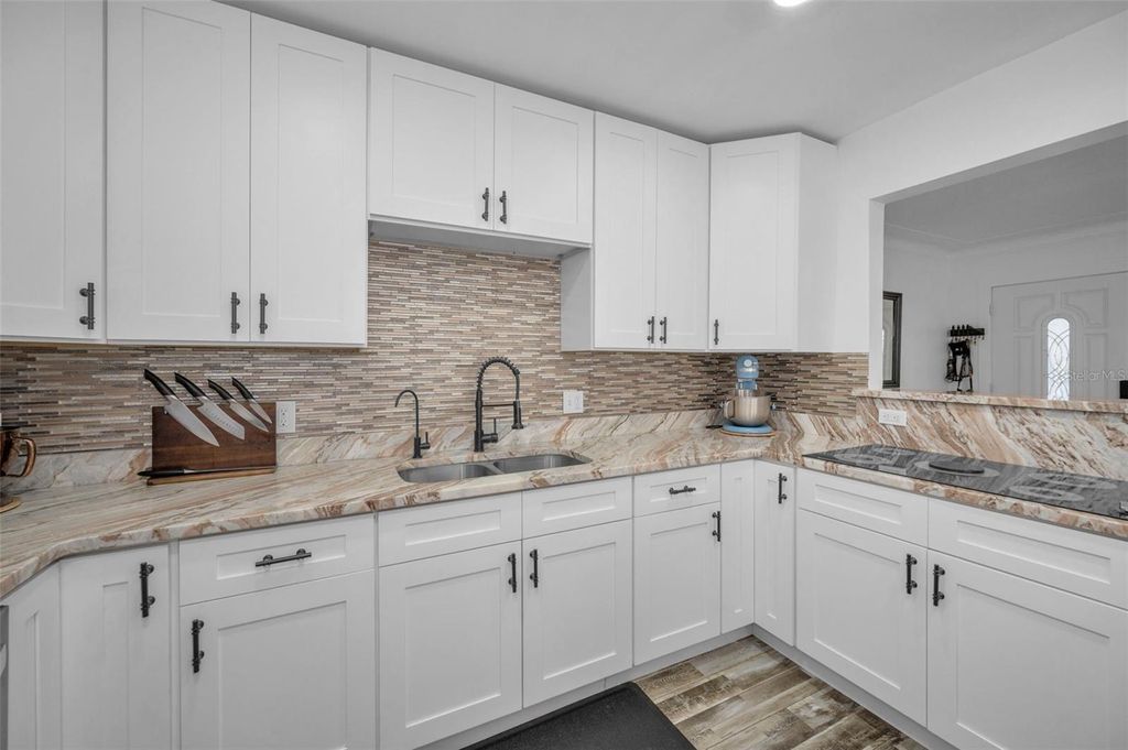 Photo of 557 77th Avenue, St Pete Beach, FL 33706 (MLS # TB8448567)