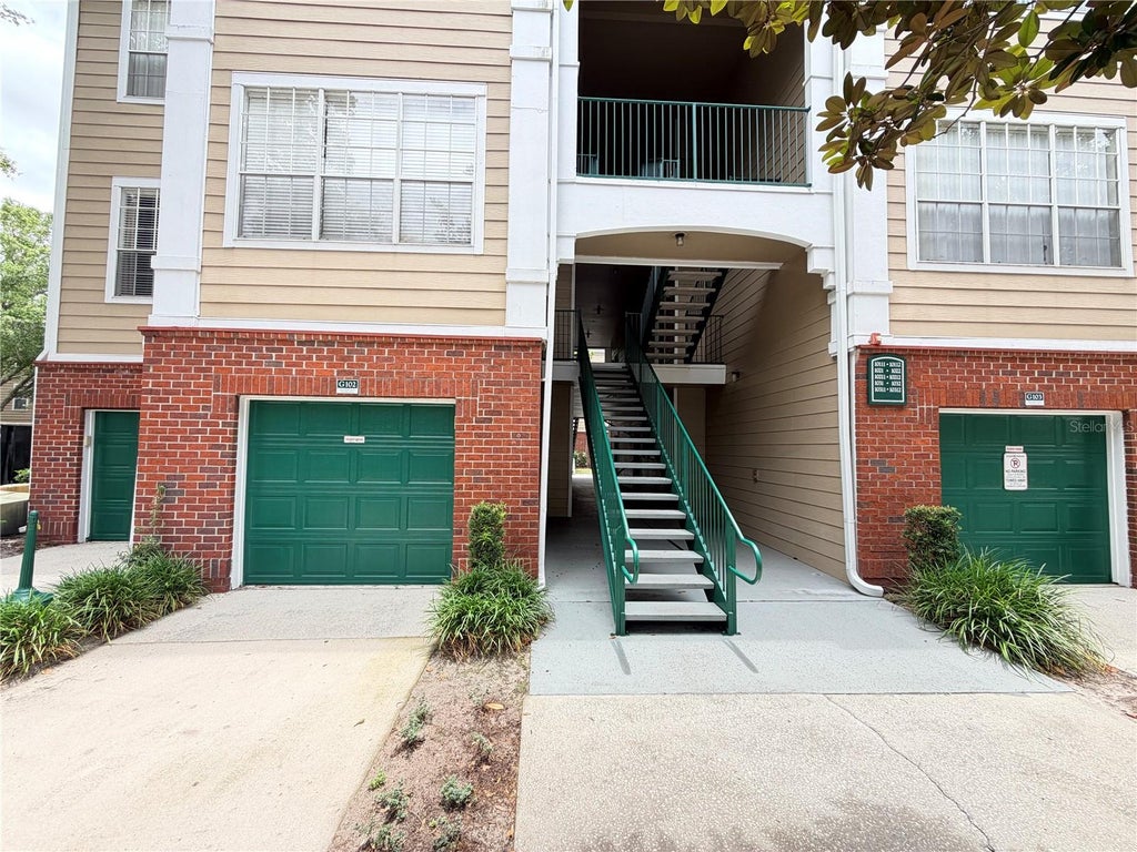 Photo of 13015 Plantation Park Circle #10111, Orlando, FL 32821 (MLS # O6414028)