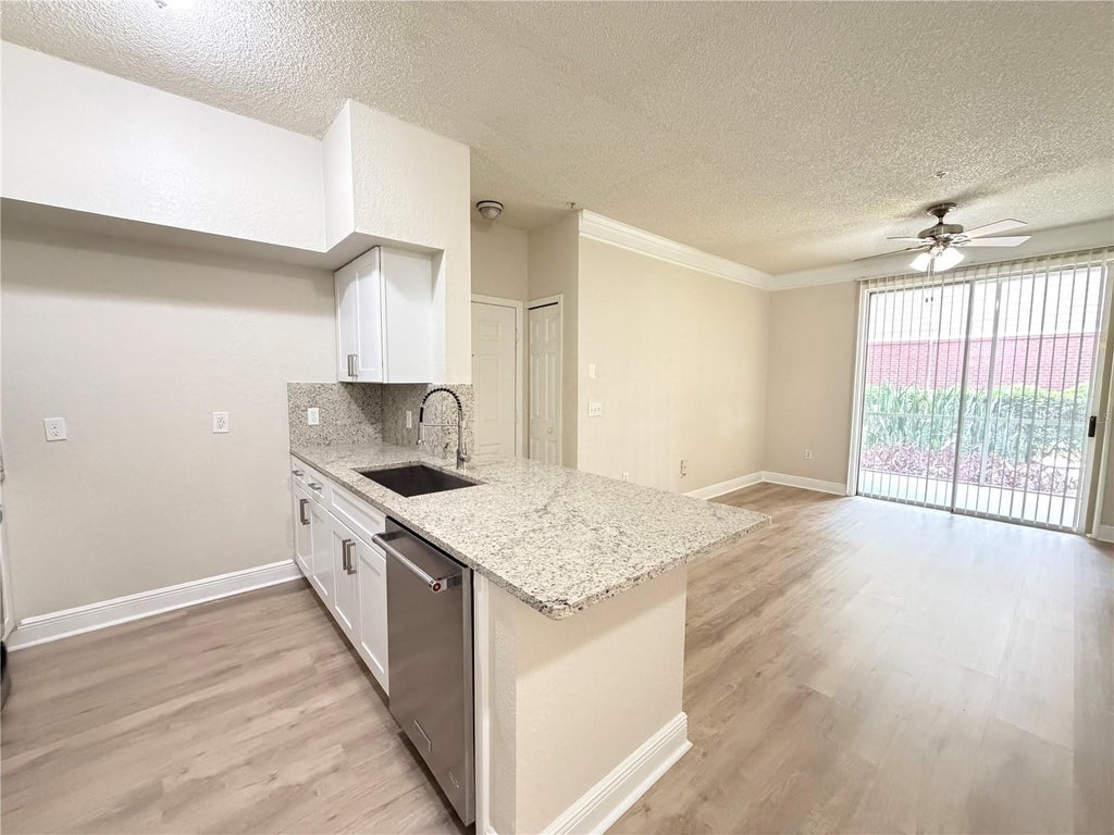 Photo of 13015 Plantation Park Circle #10111, Orlando, FL 32821 (MLS # O6414028)