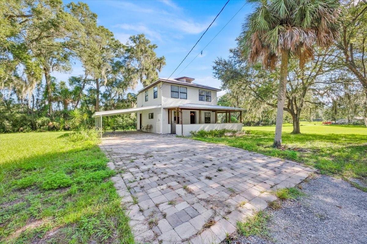 Wow - Unique opportunity in Deland, Florida, featuring three contiguous lots totaling 2.7 acres with a mix of commercial, residential, and partial commercial zoning on busy Highway 17. Key features include:
• Versatile Zoning: The property offers a combination of commercial and residential zoning, with partial commercial zoning directly on Highway 17, providing diverse development potential.
• The 2-Story House: o Upstairs: 2 bedrooms, 1 full bath, and a bonus room that could serve as a 3rd bedroom. o Downstairs: Living room with a wood-burning fireplace and hardwood floors, kitchen, dining area, inside laundry, and a 1/2 bath. Outdoor Amenities: A large wrap-around porch with a swing and a carport capable of parking two vehicles.
• Water Supply: The property benefits from a 4" well and water softener connected to the house, plus an additional 2" well on one of the other lots. • HVAC: Two separate HVAC units, one for each floor
***Call Volusia Zoning for more details***.