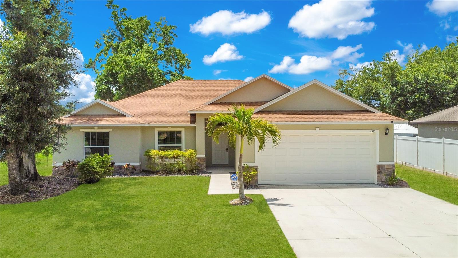 Welcome to your dream home! This beautifully designed 3-bedroom, 2-bath property offers the perfect blend of comfort, style, and functionality—all with no HOA! Step inside to find an open-concept floorplan that seamlessly connects the spacious living, dining, and kitchen areas—ideal for entertaining or relaxing with family. The heart of the home is the stunning kitchen featuring a large island, perfect for meal prep, casual dining, or gathering with friends. Enjoy the privacy and space of a generous yard, perfect for outdoor living, gardening, or even adding a pool. Whether you're hosting a backyard BBQ or just soaking up the sun, you'll love the room to spread out and enjoy. Nestled in quiet Auburndale where you can relax but a short drive to Tampa and Orlando for work or play! Come check it out!