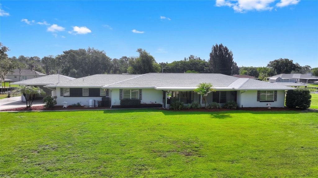 Photo of 6197 Amaryllis Drive, Indian Lake Estates, FL 33855 (MLS # P4939269)