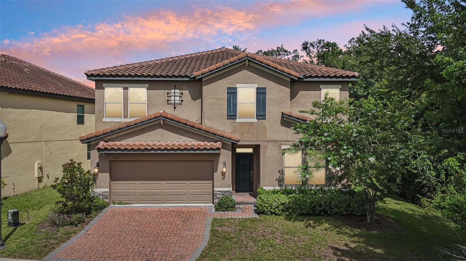 WALKING DISTANCE TO THE CLUBHOUSE | LOW HOA FEES | NO CDD | FULLY FURNISHED
Welcome to 1833 Benoit Terrace in the prestigious, 24-hour guard-gated community of Providence in Davenport, Florida. This stunning two-story residence offers over 3,000 square feet of thoughtfully designed living space and showcases the perfect blend of luxury, functionality, and comfort.
Featuring five generously sized bedrooms, three and a half bathrooms, and a spacious two-car garage, this home was built for those who enjoy both relaxed living and elegant entertaining. Upon entry, you are greeted by a versatile formal dining room or office space, and an abundance of natural light through double-pane windows that are designed for easy cleaning and energy efficiency.
The upgraded kitchen is a chef’s dream, complete with stainless steel appliances, granite countertops, abundant cabinetry, a stylish center island, and a convenient butler’s pantry. It opens to a large living and dining area with upgraded ceramic tile flooring in all wet areas, providing a seamless flow for everyday living and entertaining.
This home offers a flex room downstairs, providing flexibility and privacy for a variety of living arrangements. Upstairs also includes a spacious loft that can be used as a family room, game room, or additional office space, along with two more bedrooms.
Step outside and experience a true private retreat. The backyard features a heated saltwater pool with color-changing lighting built into the pool cage, a built-in outdoor kitchen, and integrated outdoor speakers. The covered lanai overlooks the golf course’s 9th hole and offers peaceful views with no rear neighbors, creating a perfect atmosphere for year-round relaxation and entertainment.
The home is located in the Fairway Villas section of Providence, an award-winning community known for its resort-style amenities. Residents enjoy access to a championship golf course, clubhouse, swimming pools, tennis courts, a fitness center, and other recreational facilities. The property is conveniently located near shopping, dining, medical facilities, and major highways, with easy access to all that Central Florida has to offer.
Professionally maintained and move-in ready, this home presents an exceptional opportunity to enjoy upscale living in one of the area’s most desirable gated communities. Schedule your private tour today and experience the lifestyle that awaits.