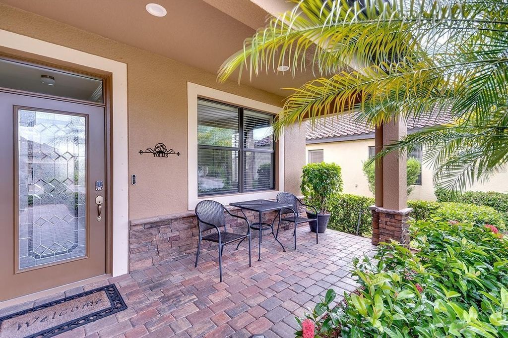 Photo of 319 Whispering Palms Lane, Bradenton, FL 34212 (MLS # A4683797)