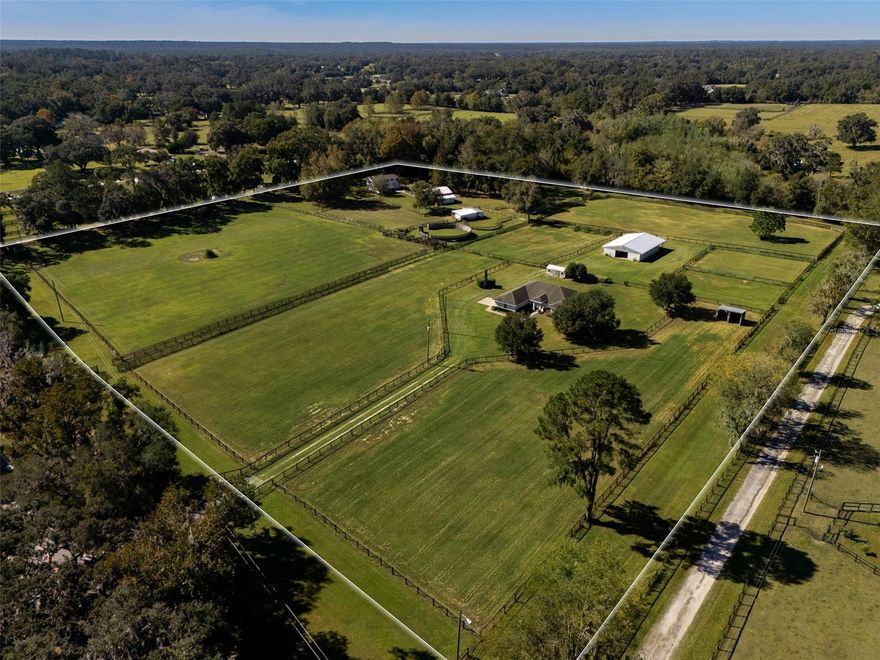 Discover an exceptional opportunity with this 12.94-acre farm, ideally located less than 10 minutes from both the World Equestrian Center and HITS! Fully fenced and thoughtfully laid out for equestrian use, the property features seven paddocks and a round pen, along with a center-aisle 6-stall barn with space for an office, feed/tack room, and washracks with hot water. The main home features high ceilings, 3 bedrooms, 2 full bathrooms, tile and carpet flooring, a Florida room, and a two-car garage, providing a solid foundation to personalize and make your own. The property also includes two additional dwellings, presenting further possibilities and ready for updating. With its prime location, this farm is ready for you to transform it into your ideal property.