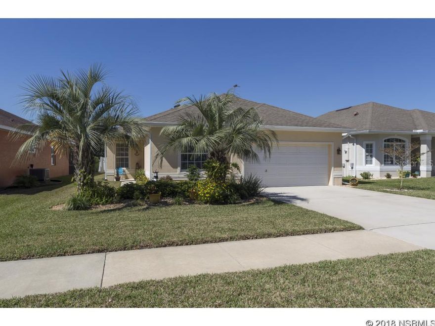 REDUCED $10K. This home is immaculate inside and out! Enjoy a newer home complete with a solar-heated saltwater pool across from the conservation area. You couldn't replace this home for this price! You'll love the vaulted ceilings and open floorplan of this 3BR/2BA, especially the updated kitchen and baths.  The kitchen is outfitted with new corian counters and tile backsplash. You'll enjoy the breeakfast nook looking out over the covered lanai and screen room. The bathrooms have been totally redone and include a jacuzzi tub and body jets in the showers. The master suite is complete with walk-in closet, double vanity, garden tub and separate shower. Both guest bedrooms have new wood laminte floors.  Relax in the large family room or enjoy formality in the separate dining room. You'll have peace of mind with hurricane resistant sliding glass doors with shutters for the windows. This home has been tastefully decorated with upscale fans, light fixtures and other fine finishes throughout. There's even an indoor laundry room connecting the home to the spacious garage. Attic includes a lighted storage area. Gas fire pit and cabana on back porch convey with sale.  MEASUREMENT ARE APPROXIMATE. ALL INFORMATION IS DEEMED RELIABLE BUT NOT GUARANTEED. BUYERS AND THEIR AGENTS TO VERIFY INFOMATION DEEMED IMPORTANT TO THEM.