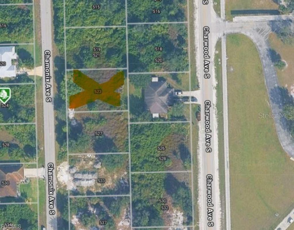 Photo of 525 Chamonix Avenue S, Lehigh Acres, FL 33974 (MLS # A4693509)
