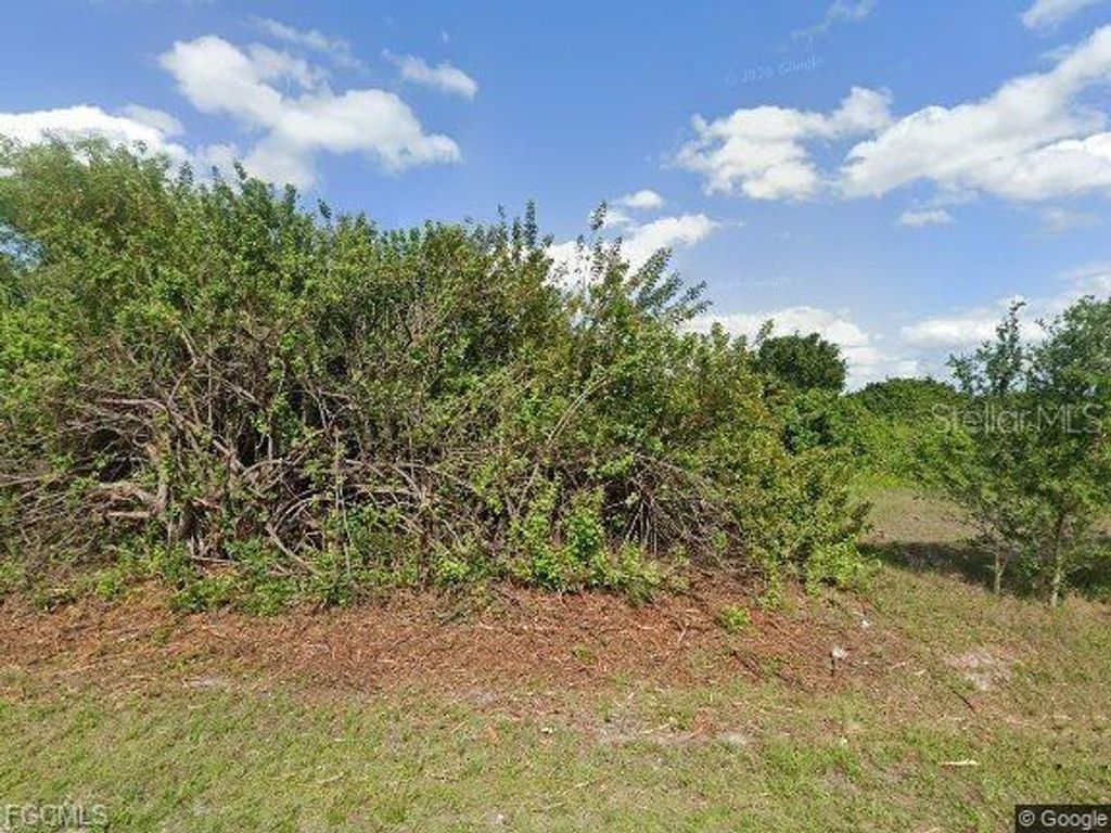 Photo of 525 Chamonix Avenue S, Lehigh Acres, FL 33974 (MLS # A4693509)