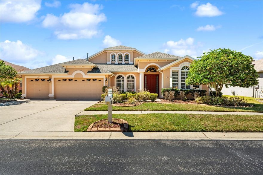Welcome to this stunning 5-bedroom, 3-bath residence offering over 3,500 square feet of thoughtfully designed living space in a desirable gated community zoned for top-rated Wiregrass schools. Perfectly positioned to capture serene pond views, this home combines elegance, comfort, and functionality.

Step inside to be greeted by soaring volume ceilings and an abundance of natural light, highlighting the home’s impressive architectural details, including tray ceilings and refined finishes throughout. The open-concept layout is ideal for both everyday living and entertaining.

At the heart of the home is a chef’s dream kitchen, featuring ample cabinetry, expansive counter space, and a layout designed to inspire culinary creativity while seamlessly connecting to the main living areas.

The massive primary suite serves as a private retreat, offering generous space, a luxurious en-suite bath, and a tranquil atmosphere to unwind. Additional bedrooms are well-appointed, providing flexibility for guests, family, or a home office.

Enjoy peaceful mornings and breathtaking sunsets overlooking the picturesque pond from your outdoor living space. A spacious three-car garage adds convenience and ample storage.

This exceptional home offers the perfect blend of upscale living and prime location—schedule your private showing today.