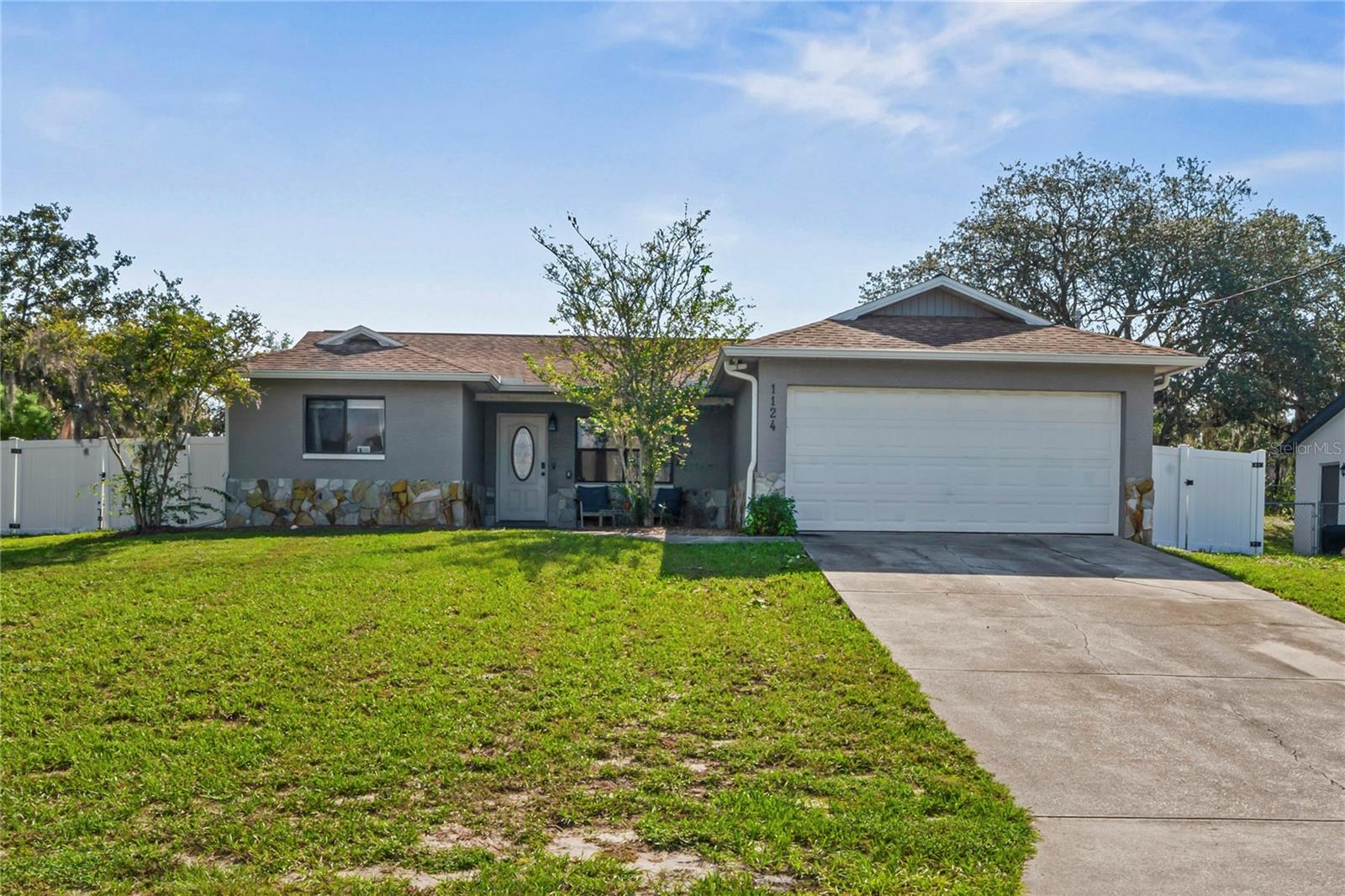 Step into this beautifully maintained, move-in ready home featuring an open floor plan and a neutral color palette that suits any style. The split-bedroom layout provides privacy and plenty of space to entertain guests. Enjoy peace of mind with a fully fenced yard and no direct rear neighbors for added privacy. The spacious bedrooms offer comfort and flexibility, and you'll love that there's no carpet anywhere—perfect for easy maintenance and a modern look. Conveniently located near all major roads, commuting is quick and hassle-free. Roof 2020 and HVAC 2021 Don't miss out—schedule your private tour today and make this your new home!