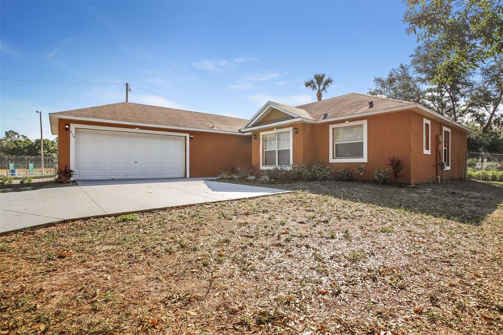 Photo of 919 Cumbran Lane, Kissimmee, FL 34758 (MLS # O6396067)