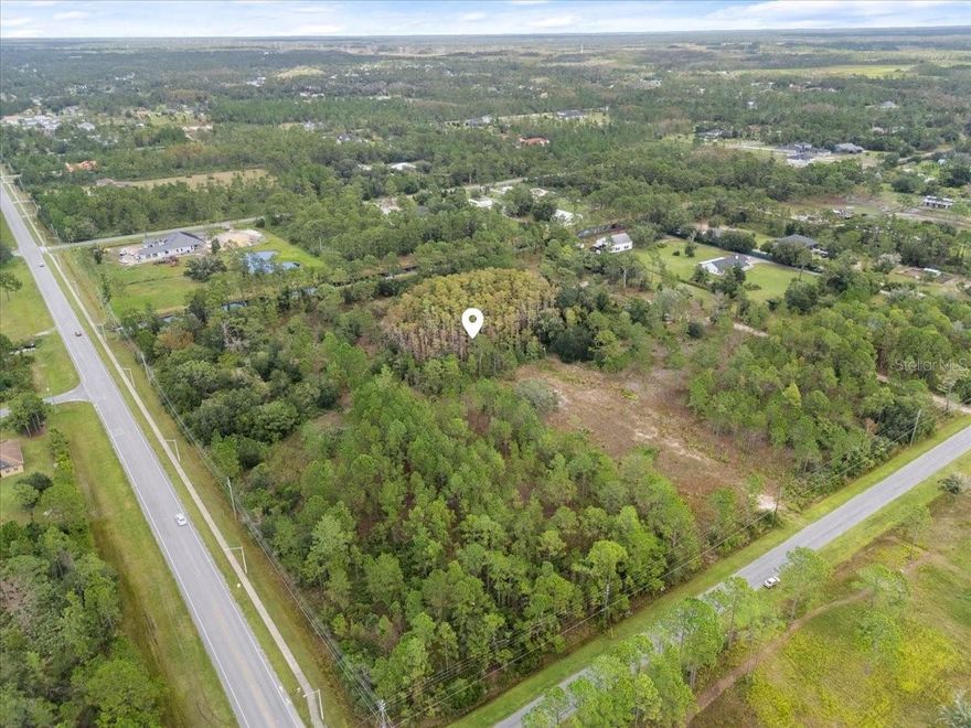 Build your dream home on over two acres of land in the sought-after community of Wedgefield. These two adjoining lots offer the perfect opportunity to create your ideal retreat with plenty of space for privacy. Located in a peaceful golf and equestrian neighborhood, Wedgefield provides a serene, country feel while still being close to everything Orlando has to offer. Enjoy easy access to Lake Nona, Medical City, the 528, 417, and 520, making your commute to Downtown Orlando, the beaches, or the airport a breeze. With no rear neighbors and the flexibility to bring your own builder, this property allows you to design and live the Florida lifestyle you’ve been dreaming of. Whether you’re ready to build now or hold as an investment for the future, this is the perfect place to call home.