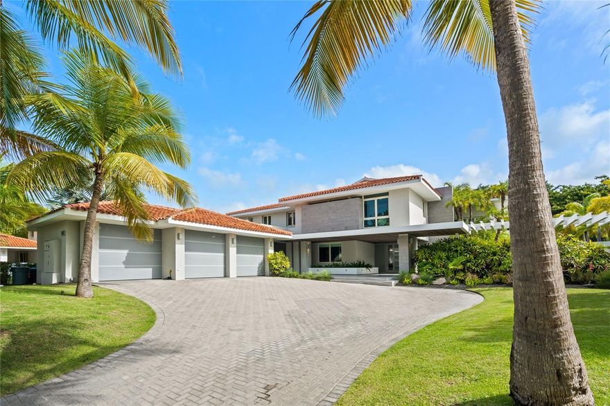 Views that stun! Designed by Lulu Puras, this impressive and fully renovated modern style home has marble floors throughout over 7,000 square feet of living space. In addition to sporting 8 bedrooms and 9 bathrooms, the home also has high ceilings, a grand living room, and a perfect layout for both entertainment and intimate living. Included in the purchase of the home are a stainless-steel water tank that holds 2,500 gallons as well as a 50kw diesel power generator. Very close to the Ritz Carlton Reserve.