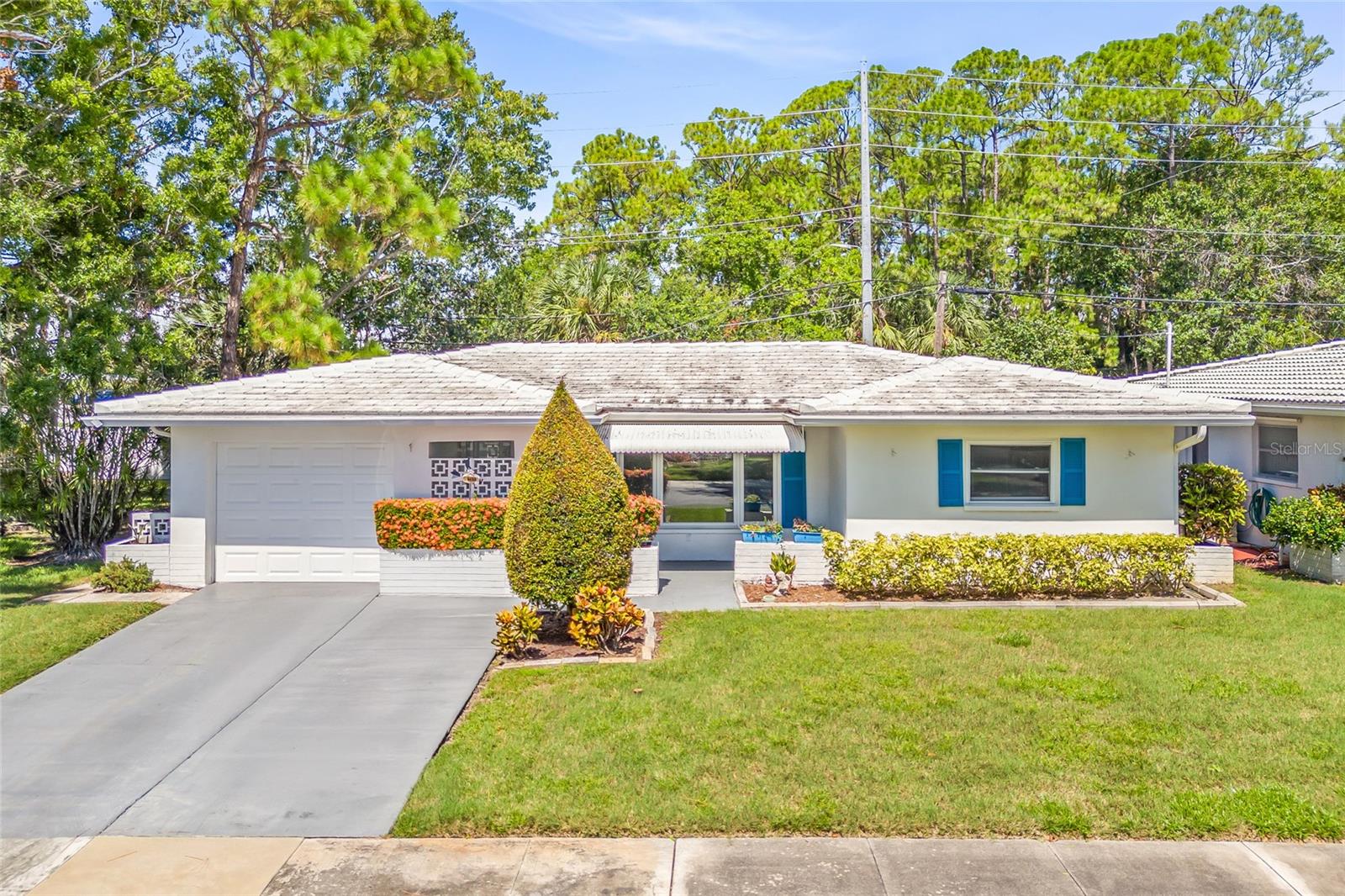 One or more photo(s) has been virtually staged. Carefree Florida Living in The Mainlands of Tamarac – Spacious End Unit with Upgrades!
Welcome to Unit 1 in the vibrant and active 55+ community of The Mainlands of Tamarac, where low-maintenance living meets a convenient and amenity-rich lifestyle. Unit 1 fees include roof replacement and exterior painting of the home. This beautifully maintained 2-bedroom, 2-bathroom home offers 1,576 square feet of thoughtfully designed living space and is perfectly positioned as an end unit with extra green space on the side for added privacy.
Inside, you’ll find a bright and spacious layout featuring solid wood flooring in the living room, dining area, and Florida room, along with stylish plantation-style shutters and a Nest thermostat for comfort and efficiency. The Florida room also offers abundant storage and a cozy retreat for reading, relaxing, or entertaining.
The kitchen and dinette area are tiled for easy care and feature white cabinetry, Corian countertops, tile backsplash, and all the essentials—including a microwave, stove, dishwasher, and refrigerator.
Additional upgrades include:
Double-pane hurricane impact windows
Tile flooring in the entryway and kitchen
Roof replaced in 2021
HOA-maintained exterior, including lawn care, edging, water, sewer, trash, roof replacement, and exterior painting
Enjoy easy access to everything the Florida lifestyle offers. Spend your days at Mainlands Golf Course or head over to nearby Freedom Lake Park, which features walking trails, fitness stations, dog parks, fishing, picnic shelters, and a playground. You're also minutes from Gulf beaches, shopping, dining, Sam’s Club, coffee shops, Helen Howarth Park, equestrian trails, and major highways connecting you to Tampa and St. Pete/Clearwater Airports.
This home offers it all—comfort, convenience, and community. Don’t miss your chance to own a piece of paradise in one of the most sought-after 55+ neighborhoods in the area.
Schedule your private showing today!