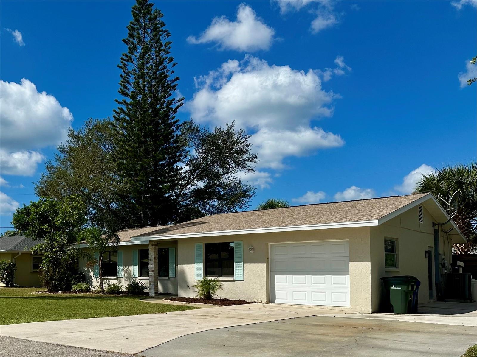Welcome to this impeccably maintained 2 bedroom 2 bath home, a desired split floor plan with an attached garage for convenience. The galley kitchen is central within the home, perfect for gatherings, and everyday living! This house offers exceptional PRIVACY with an impressive hand crafted wood fence surrounding the backyard making it a pleasure to enjoy florida outdoor living. In addition, the backyard also offers a solid and in terrific condition, 200 sq. ft. wood shed! There is also a built in fire pit, and a raised area for plants or small garden, and is surrounded by mature landscaping. This house is perfectly located! It is just two houses away from Shamrock Park, and in close proximity to the South Venice Beach Ferry and boat ramp. Also very close are the stunning Gulf beaches, shopping, dining and legacy trail, all features that beautiful historic Venice has to offer. A must see!