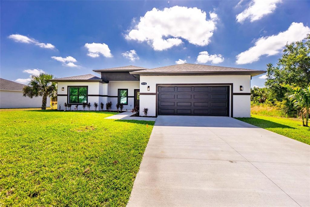 Photo of 7316 Donahue Street, Port Charlotte, FL 33981 (MLS # O6404237)