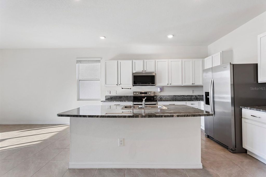 Photo of 33002 Major Oak Drive, Wesley Chapel, FL 33545 (MLS # TB8422555)