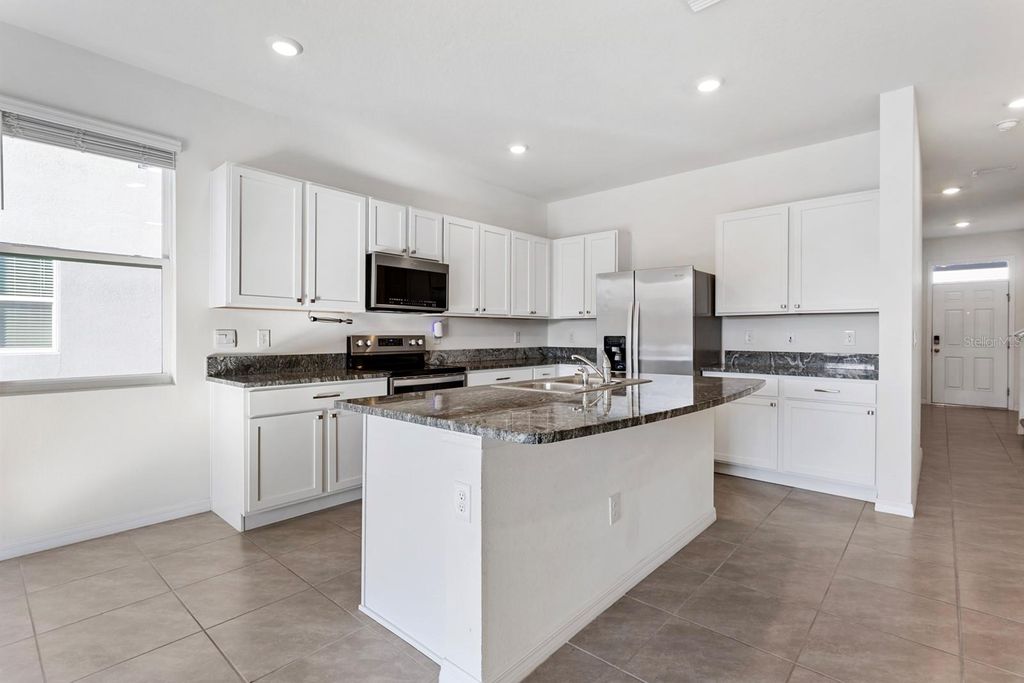 Photo of 33002 Major Oak Drive, Wesley Chapel, FL 33545 (MLS # TB8422555)