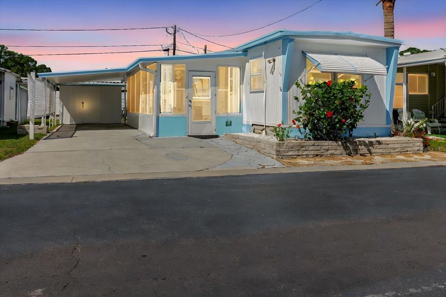 NO LOT RENT | TURNKEY 2BR/1.5BA IN 55+ CO-OP COMMUNITY
Discover your perfect Florida retreat in this beautifully maintained 2-bedroom, 1.5-bath home located in a desirable 55+ co-op community—and yes, there’s NO LOT RENT! This move-in-ready home features a sought-after split floor plan and comes mostly furnished, so you can start enjoying the sunshine right away.

The updated kitchen shines with stainless steel appliances, including a 2023 refrigerator, 2021 stove, and brand-new 2025 microwave. The main bath was fully renovated in 2022 and includes a walk-in shower & stackable washer and dryer (2022) for added convenience. Additional updates include a 2021 electrical panel, new windows in 2024, and a 2018 heat pump providing efficient central A/C. Hurricane straps add peace of mind during storm season.

Stylish laminate flooring flows throughout, complemented by tile in the Florida room—perfect for relaxing, entertaining, or working from home. Step outside to a private patio ideal for grilling or outdoor dining. A 10x8 storage shed offers plenty of room for tools, beach gear, or hobby supplies.

Located just steps from the community pool, this home is ideal for snowbirds or year-round residents seeking a low-maintenance Florida lifestyle. One resident must be 55 or older.

The ultra-low co-op fee of just $180/month covers water, sewer, trash, common area maintenance, and use of the pool & other amenities like the shuffleboard & pool hall—plus your ownership share is included in the sale, meaning no lot rent ever! Enjoy optional social activities and friendly neighbors in this welcoming community. Home was tented in September, 2025 and comes with transferrable warranty. Co-op share included in purchase price. All appliances and most furniture stays. Cash buyers only.
