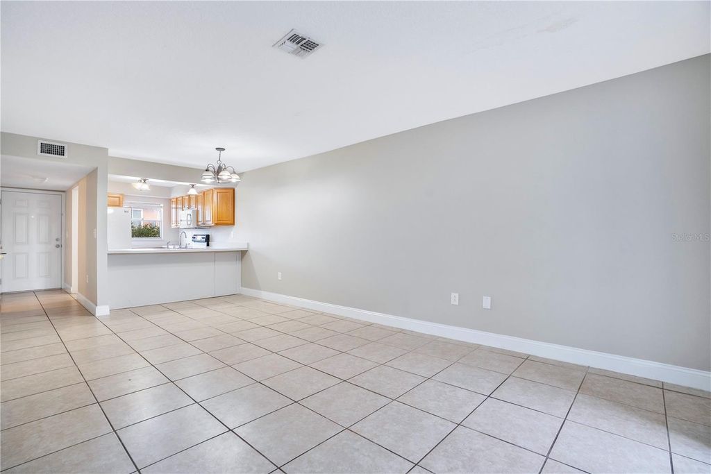 Photo of 1824 Amberly Avenue #T8, Orlando, FL 32822 (MLS # O6368707)