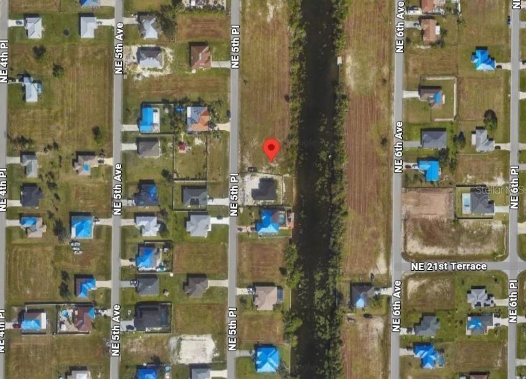 Photo of 2121 NE 5th Place, Cape Coral, FL 33909 (MLS # C7519305)
