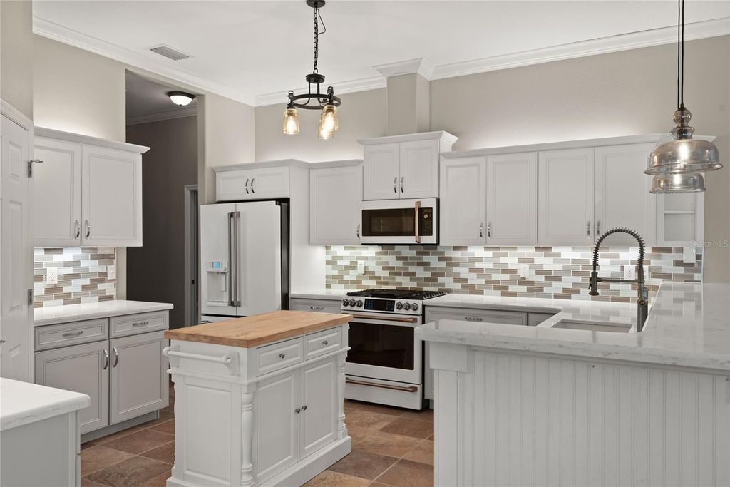 Photo of 417 Gleneagles Drive, New Smyrna Beach, FL 32168 (MLS # NS1085789)