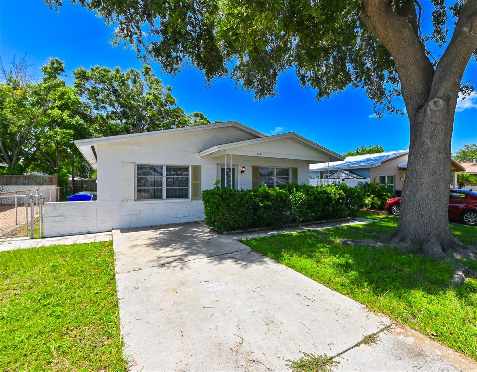 This home has been and was loved and cared for many many years. It was meticulously maintained over the years by the current owner and would make for a truly amazing home with some minor upgrades. It was so well taken care of there aren't even any vines on the fence in the back yard which is huge by the way. This lovely 2 bedroom 2 FULL bathroom home has that sense of pride of ownership bubbling inside. The property sits only minutes from TREASUE ISLAND, ST PETE BEACH, AND MORE and it's on HIGH GROUND. Tyrone Square Mall right down the street and plenty of places to eat at from Major chains to small mom and pop locations that will keep you coming back for more. Brand new CRUNCH FITNESS down the street in the same plaza as Winn Dixie. Close to it all but a quite zone of it's own. This could be an easy RENOVATION for someone or a great starter home for someone as well. Everything in the house works very well. The only thing not working is the air conditioning. I have a full video walkthrough of the home available upon request and a breakdown of if you are an INVESTOR of how you could easily and I do mean EASILY remodel this home FAST. Plenty of upside potential there in this property. Multiple comps around within close proximity well above 400k. CALL OR TEXT to come and view this home today.