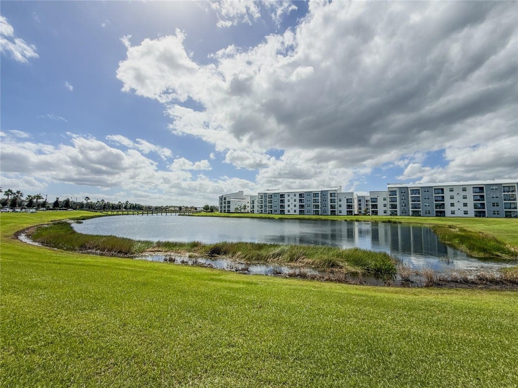 Photo of 4751 Clock Tower Drive #104, Kissimmee, FL 34746 (MLS # O6450802)