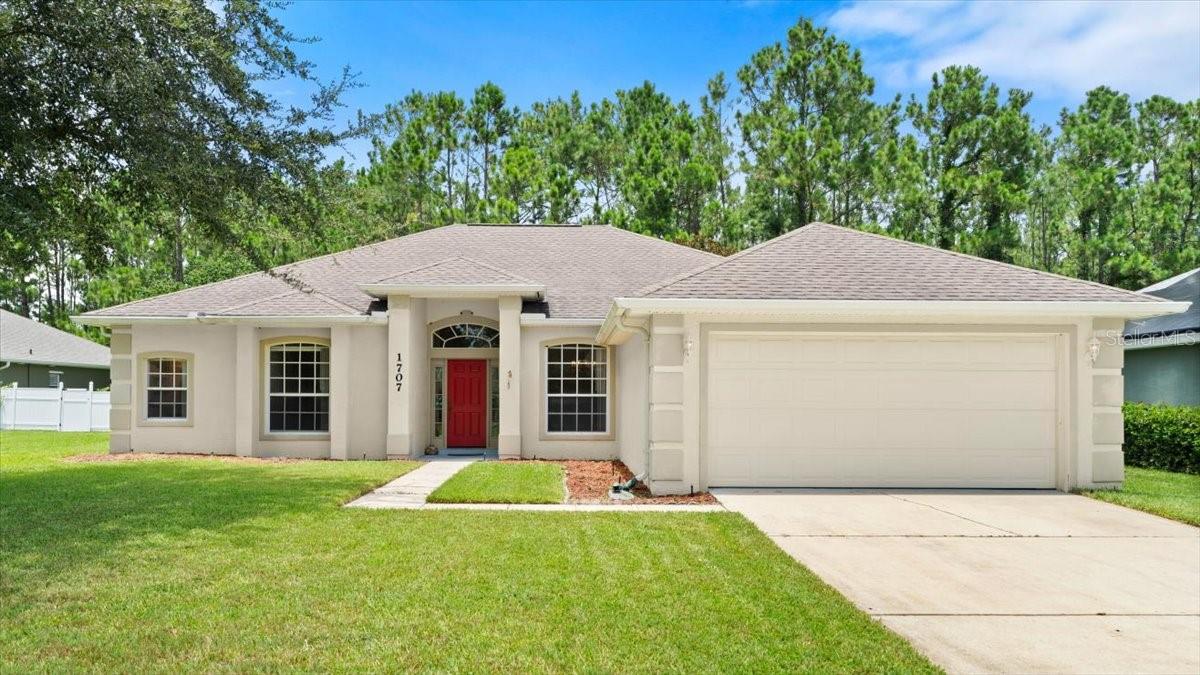 ***HIGH AND DRY*** CHARMING 4-BEDROOM 2-BATH CONCRETE BLOCK HOME IN PORT ORANGE PLANTATION ON SECLUDED CUL-DE-SAC. BEAUTIFUL LOT BACKING UP TO CONSERVATION AREA WITH RETAINING WALL. DESIREABLE SPLIT BEDROOM FLOOR PLAN FEATURES GORGEOUS LUXURY VINYL FLOORING THROUGHOUT... SPACIOUS KITCHEN OFFERS WOOD CABINETRY, PLENTY OF COUNTER SPACE, NEWER APPLIANCES, BREAKFAST BAR & PANTRY. EAT-IN KITCHEN NOOK FOR CASUAL DINING & SEPARATE FORMAL DINING ROOM FOR MORE ELEGANT OCCASIONS. GREAT HOME FOR ENTERTAINING IN FORMAL LIVING ROOM W/HIGH CEILINGS, OR KICK BACK AND RELAX IN SPACIOUS FAMILY ROOM WITH SLIDER ACCESS TO COVERED LANAI OVERLOOKING PRIVATE BACK YARD, SURROUNDED BY NATURE! 18 X15 PRIMARY BEDROOM EN-SUITE W/WALK-IN CLOSET & BUILT-IN SAFE... SPA-LIKE BATH W/JACUZZI TUB, WALK-IN SHOWER & PRIVATE TOILET. SEPARATE GUEST WING W/TWO BEDROOMS AND REMODELED FULL BATH. 4th BEDROOM, PERFECT FOR HOME OFFICE, DEN, WORKOUT SPACE OR CRAFT ROOM. HOME ALSO INCLUDES NEWER INTERIOR PAINT, INSIDE LAUNDRY, 5" BASEBOARDS, RECESSED LIGHTING, TWO CAR GARAGE W/RETRACTABLE SCREEN, ADDED WALL INSULATION FOR ENERGY EFFICIENCY, SOFFITS & ACCENT LIGHTING OUTLESTS... GREAT LOCATION NEAR THE PAVILLION SHOPS & RESTAURANTS... LESS THAN TEN MILES TO THE BEACH AND INTRACOASTAL WATERWAY... 15-MINUTE DRIVE TO DAYTONA INTERNATIONAL AIRPORT AND DAYTONA INTERNATIONAL SPEEDWAY....