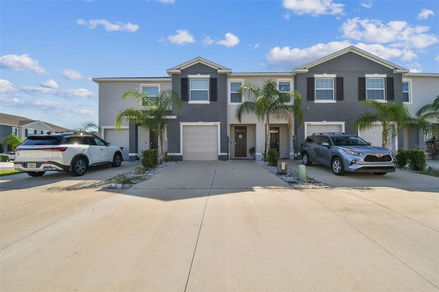 Welcome to The Preserve at South Branch in Odessa! This stunning 3-bedroom, 2.5-bath townhome with a 1-car garage offers the perfect blend of comfort, convenience, and community living. Nestled in the back of the community for added privacy, this home sits in a top-rated school district and is just minutes from the Veterans/Suncoast Parkway, Tampa Premium Outlets, shopping, dining, medical facilities, Tampa International Airport, downtown Tampa, and Florida’s world-famous beaches.  Step inside through the inviting foyer and be greeted by a bright, open floor plan featuring ceramic tile throughout the main floor and tasteful upgrades at every turn. The gourmet kitchen is the heart of the home, boasting granite countertops with breakfast bar seating, rich wood cabinetry, stainless steel appliances, a walk-in pantry, and a dedicated dining area. The kitchen flows seamlessly into the spacious living room and out to the screened lanai—perfect for entertaining guests or enjoying quiet evenings at home. Upstairs, retreat to the owner’s suite complete with dual walk-in closets and a spa-like ensuite bathroom featuring dual vanities and a walk-in shower with double shower heads. Two additional generously sized bedrooms with upgraded ceiling fans, a full bathroom, and a convenient laundry closet with washer and dryer round out the second floor. Additional highlights include: Garage with storage racks, bike hooks, water softener, hurricane shutters, extra storage under the stairs, and extended driveway parking for up to four cars. Smart home features including keyless entry, Ring doorbell, thermostat control, wireless garage door opener, motion sensors, and smart lighting. Living in The Preserve means enjoying resort-style amenities, including a clubhouse with fitness center, Olympic-sized lap pool, heated zero-entry pool, sports fields, basketball courts, playground, dog park, walking trails, picnic areas, and private access to the Suncoast Trail. This home offers not just a place to live, but a lifestyle you’ll love.