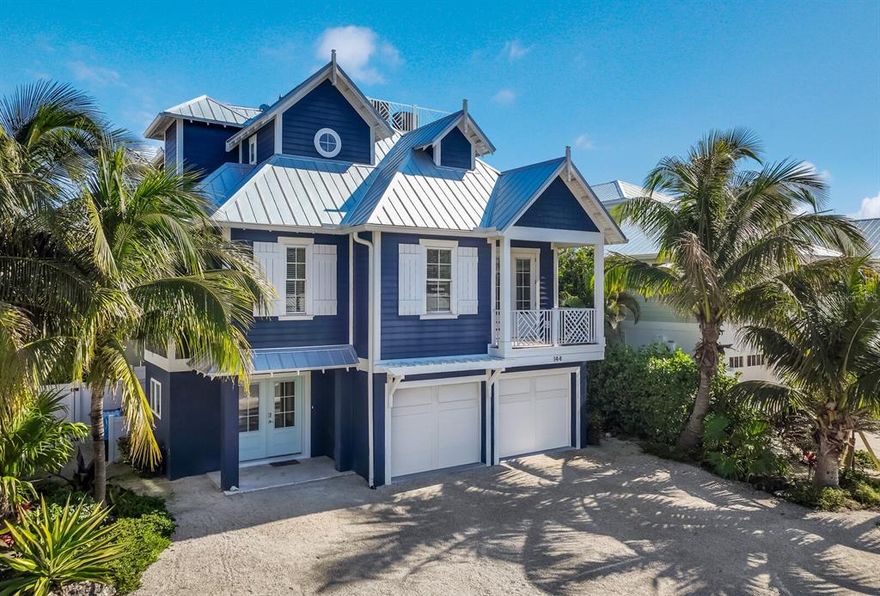 CASH FLOW - GROSSING $250K in 2022 and NETTED after ALL expenses over $130K!!! Over $200K so far on the books for 2023!!! Absolutely stunning CUSTOM home! - Welcome to Casa Amiga! This home was tastefully built in 2018. The three story home is comprised of 4 bedrooms, 4.5 baths and located in the beautiful and highly desired City of Anna Maria! Casa Amiga is in a PRIME LOCATION; just a short walk to the Bay, Gulf Beaches, popular Bean Point, and the always fun Pine Avenue. Arriving at your future home you will be drawn in by the Key West architectural structure providing that charming island appeal. The entryway reveals a warm and welcoming foyer that sets the tone for the luxury features and design excellence boasting throughout the home. Take the elevator/stairs to the main level and you will find a  spacious open living space featuring vaulted shiplap ceilings, craftsman wood work finishes, luxury flooring, and plenty of windows for natural light. The centrally located Dream kitchen has been beautifully designed with custom cabinets, QUARTZ countertops, large center Island with inviting breakfast bar, stainless steel appliances, and herringbone tile backsplash. The Large open concept kitchen, dining, and living room combo will make entertaining a breeze! The main floor offers three ensuite bedrooms with plenty of privacy for all and a half bath for guests.  Escape to complete serenity on your third floor Primary's suite offering oversized walk-in closet, large bathroom including custom ceramic tile flooring, spacious walk-in shower with gorgeous custom tile finishes and rainfall shower. The Primary's retreat has a private loft style reading room equipped with a beverage station for your morning coffee or a glass of wine to enjoy the beautiful sunset on the rooftop deck. The rooftop deck offers a 360-degree view of the north end of the island including Lake LaVista and the Tampa Bay! Enjoy those sunny Florida days on any of your three balconies offering views from all points of the home. Multiple sliding glass doors lead you to your outdoor living oasis, which is truly what Florida living is all about! Your private fully fenced spacious backyard boasting in-ground POOL with overflow SPA, outdoor shower, plenty of covered patio space, and outdoor bar area ideal for entertaining!  Not to mention...Casa Amiga is a very successful weekly rental with a special occupancy for 10.  This beautiful home is full of everything you need and more to live in and/or rent out. This home comes fully furnished and is ready for its new owner. Check out the matterport 3D video walkthrough at https://listing.thehoverbureau.com/ut/144_Crescent.html