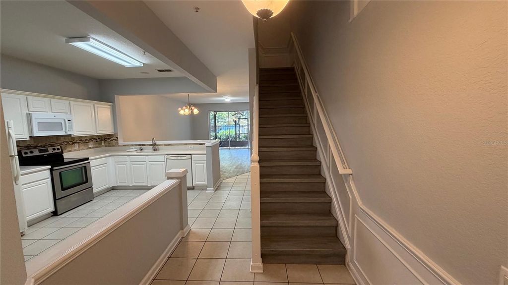 Photo of 3336 Shallot Drive #104, Orlando, FL 32835 (MLS # O6427056)