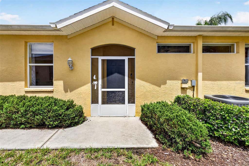 Photo of 1322 Fairway Greens Drive #69, Sun City Center, FL 33573 (MLS # TB8543049)