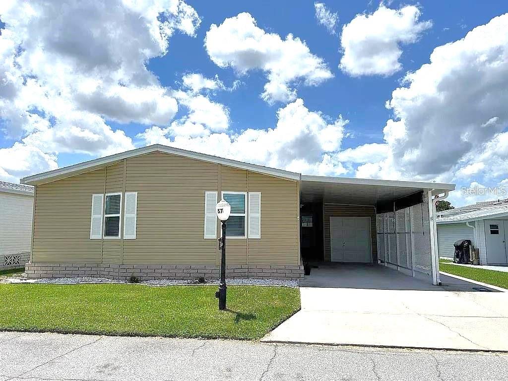 Photo of 57 Straphmore Drive, Haines City, FL 33844 (MLS # P4940074)
